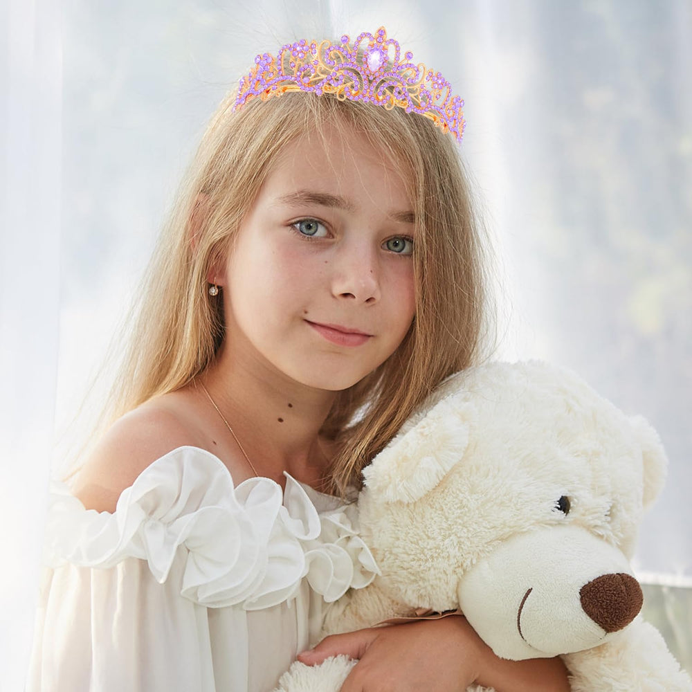 Didder tiara on wedding look with sparkling rhinestones and gold crown.