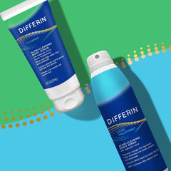 Differin body spray back area being misted for even coverage.