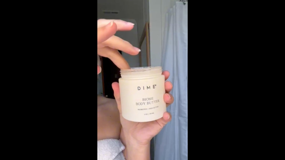 DIME Beauty Biome Body Butter jar close-up shows creamy, non-greasy hydration.