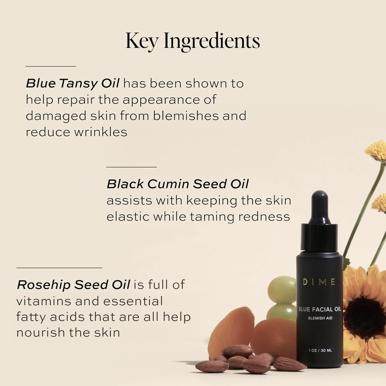 DIME Beauty Blue Facial Oil dropper releasing precise drops for application.