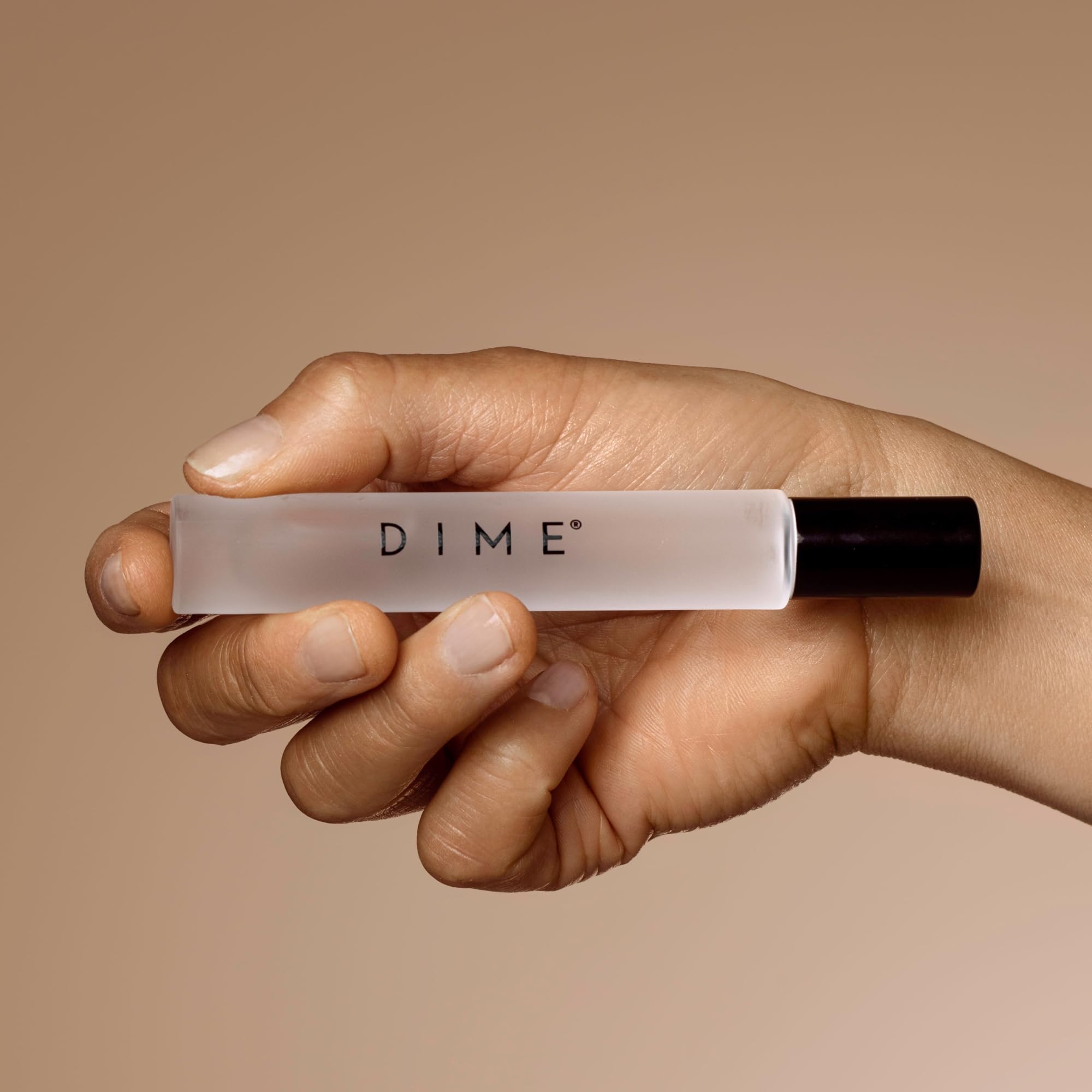 DIME Beauty Core Memory travel perfume packaging highlights convenient size for travel.