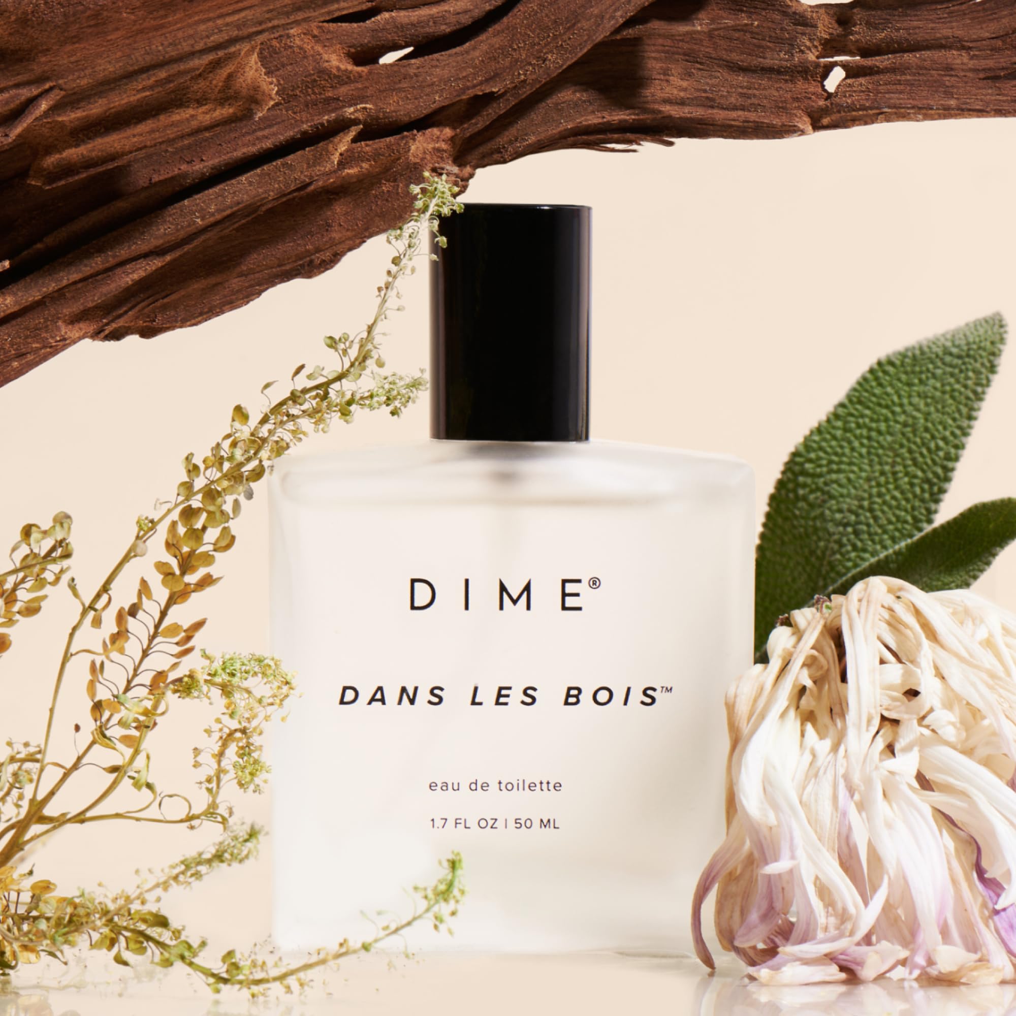 DIME Dans Les Bois spray-action shot suggests easy daily application.