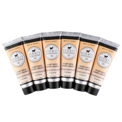 Dionis goat milk hand cream set six tubes on display for travel-friendly moisture