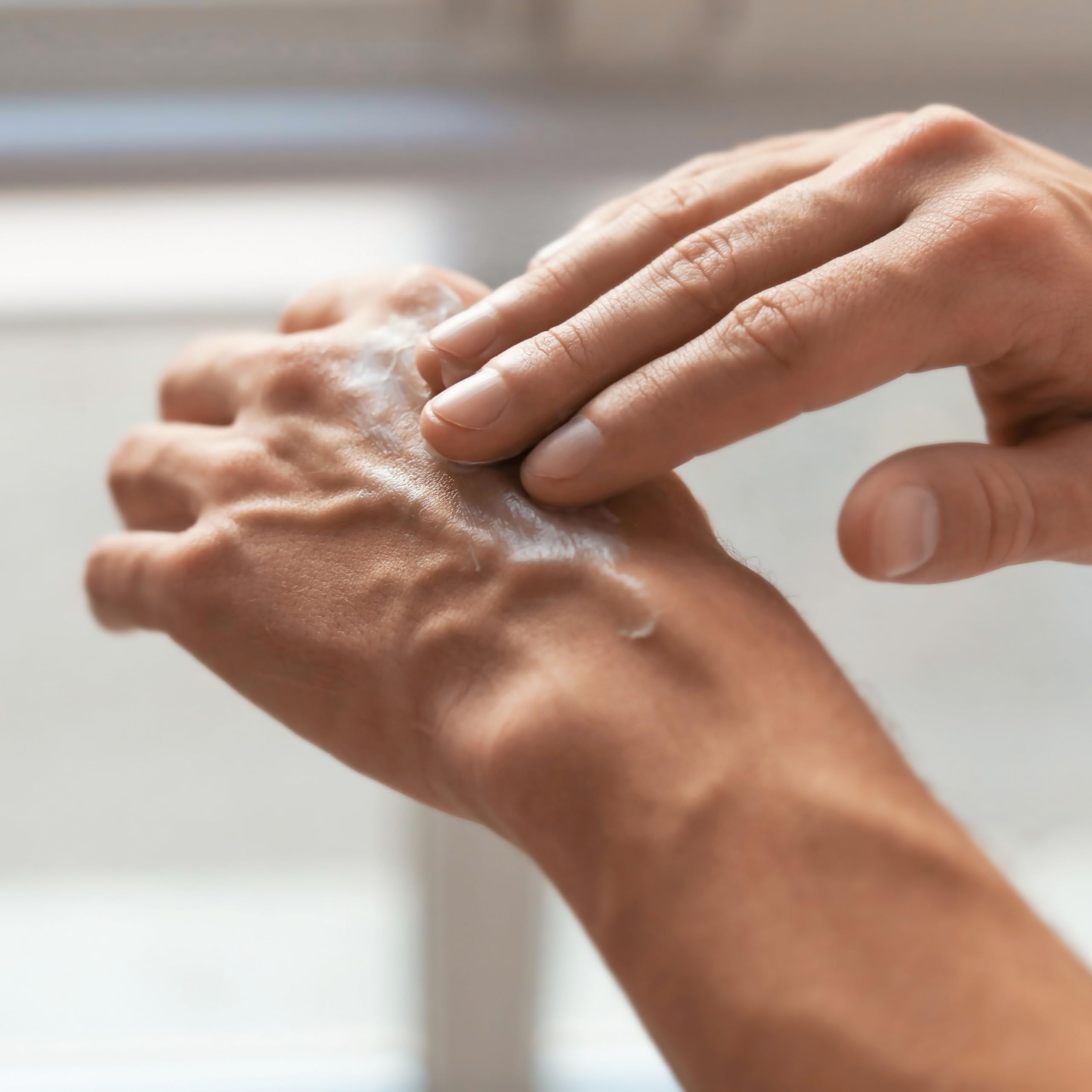 Dionis hand cream being absorbed on skin
