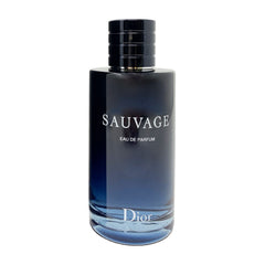 Dior Sauvage amber-woody base note close-up conveying richness.