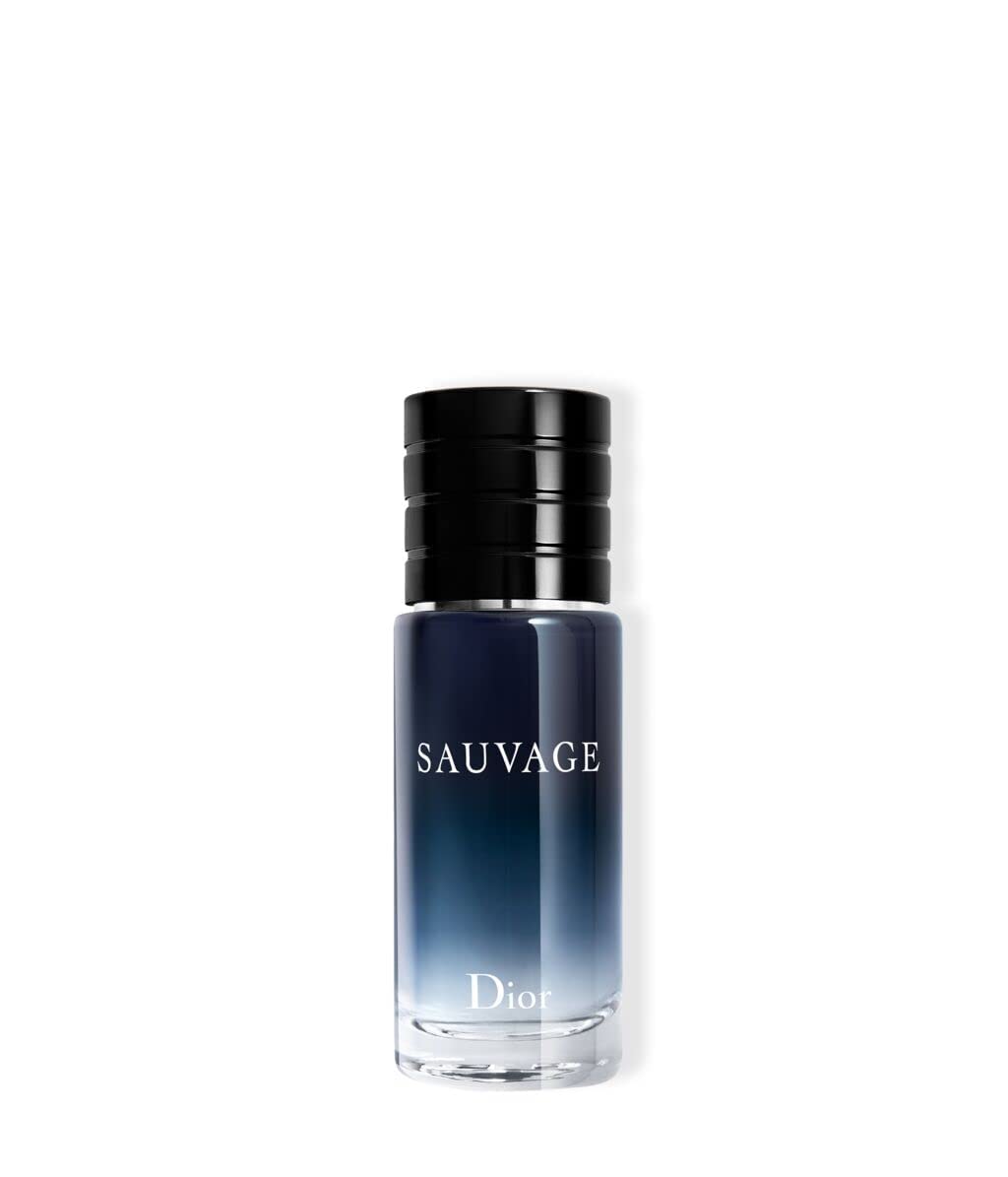Dior Sauvage bottle cap close-up suggesting bold evening wear.