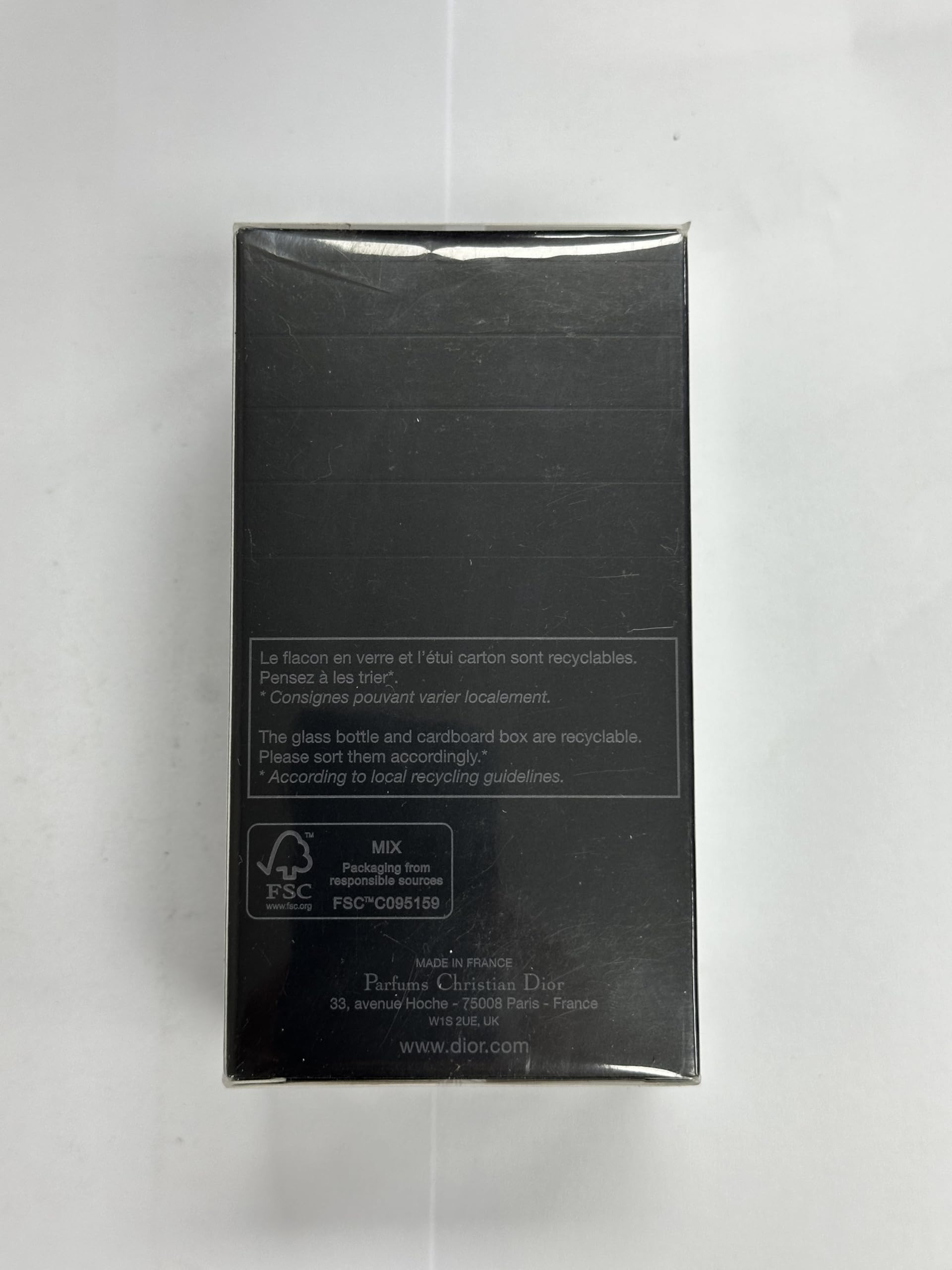 Dior Sauvage Parfum Spray 2 oz lifestyle shot suggesting evening wear