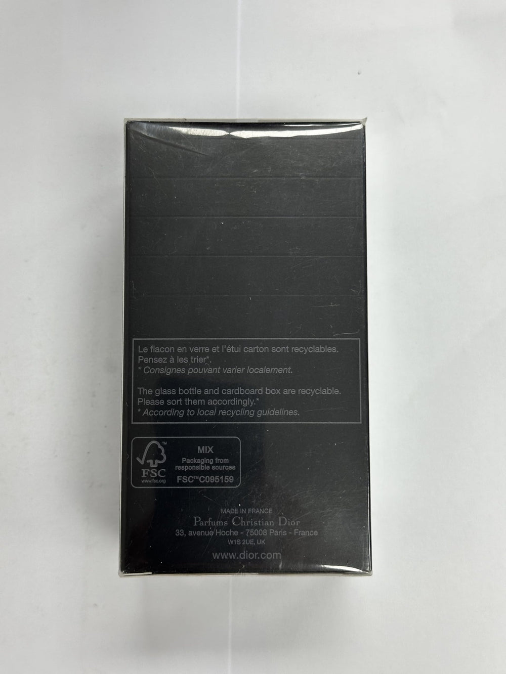 Dior Sauvage Parfum Spray 2 oz lifestyle shot suggesting evening wear