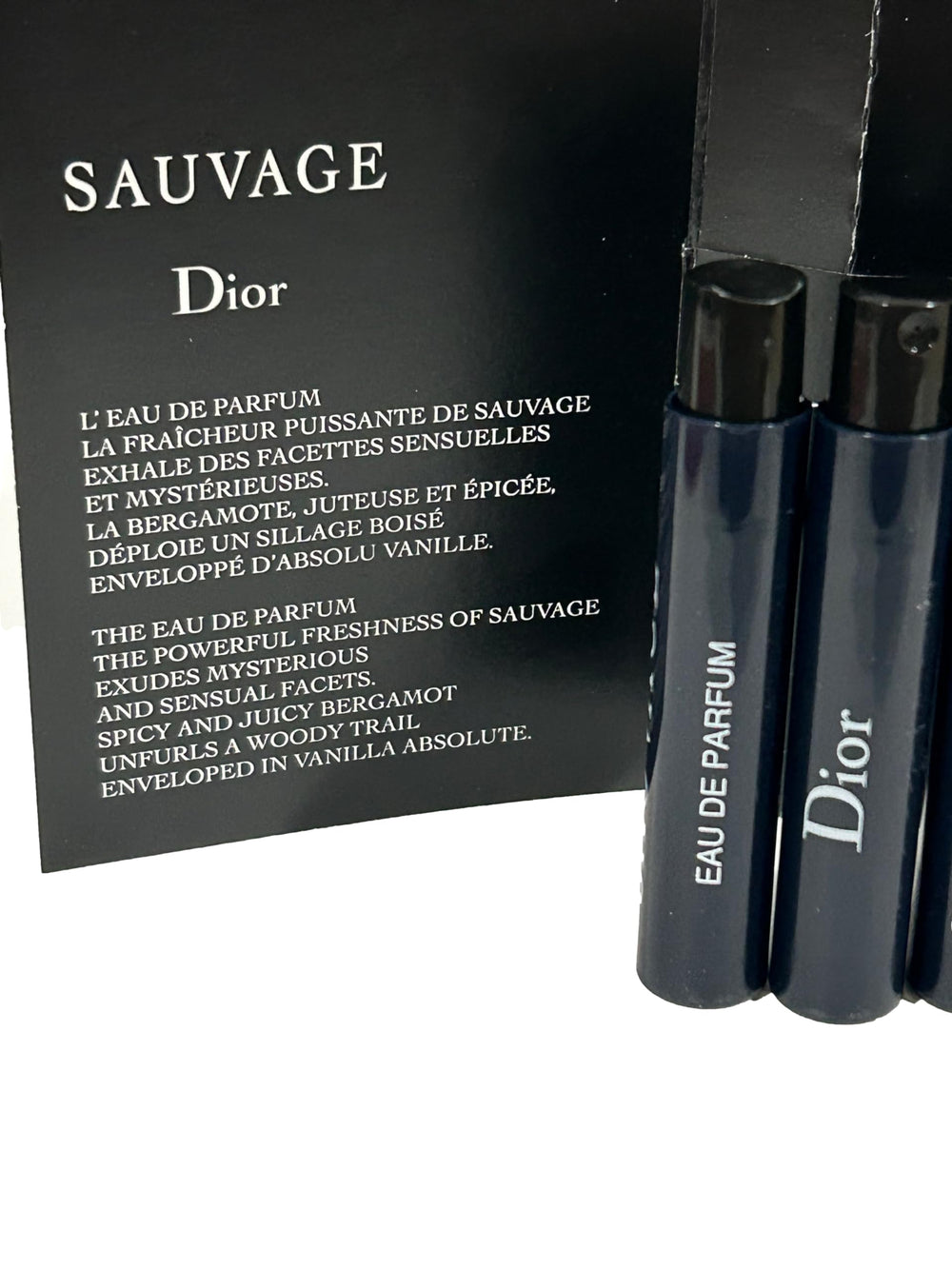 Dior Sauvage wood-scent bottle close-up highlights warm, woody notes for evening allure.
