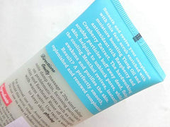 Dirty Works Pore-Fect Face Scrub closeup reveals micro-exfoliants for smoother skin.