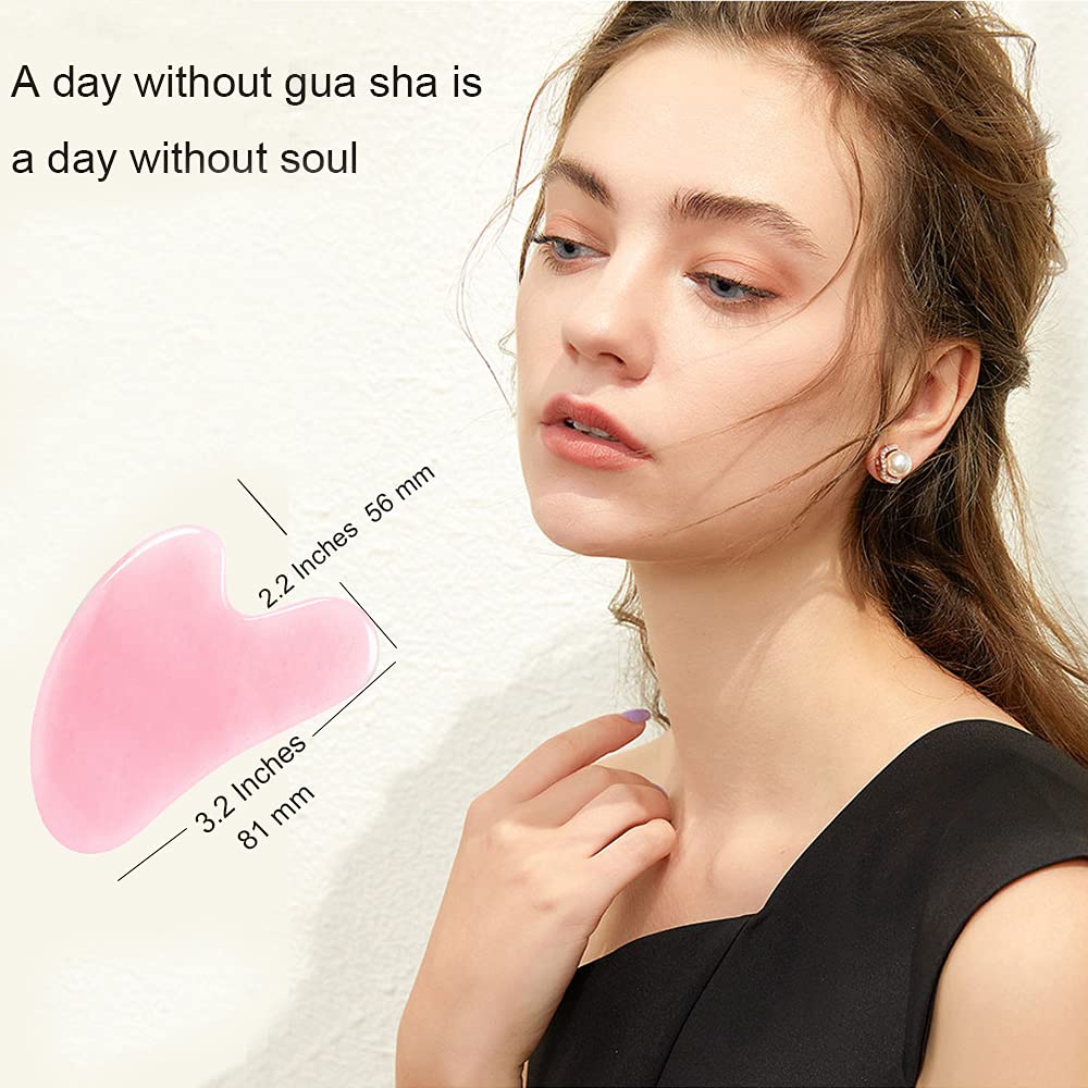 Ditind Rose Quartz Gua Sha in use on face during daily skincare routine.