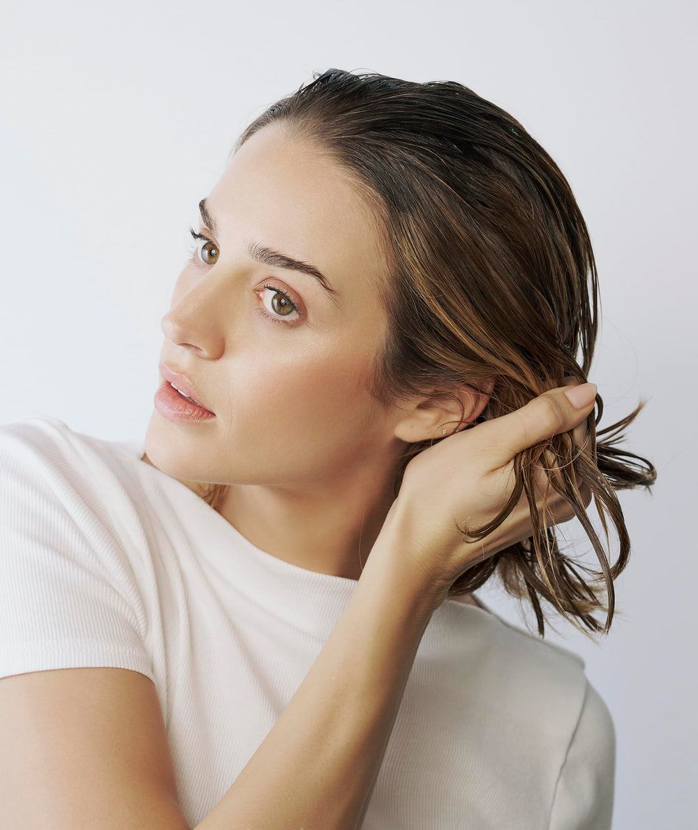 Divi Air Dry Styling Cream on natural hair reduces frizz in humid weather.