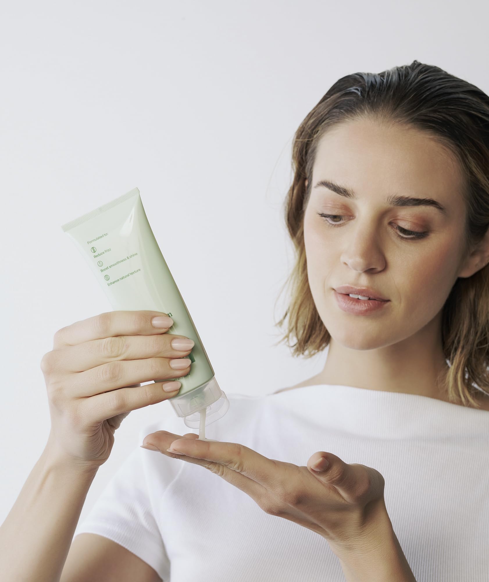 Divi Air Dry Styling Cream provides soft shine and moisture to hair.