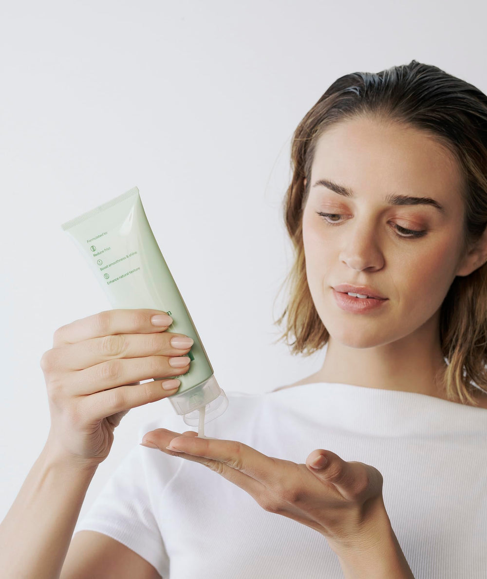 Divi Air Dry Styling Cream provides soft shine and moisture to hair.