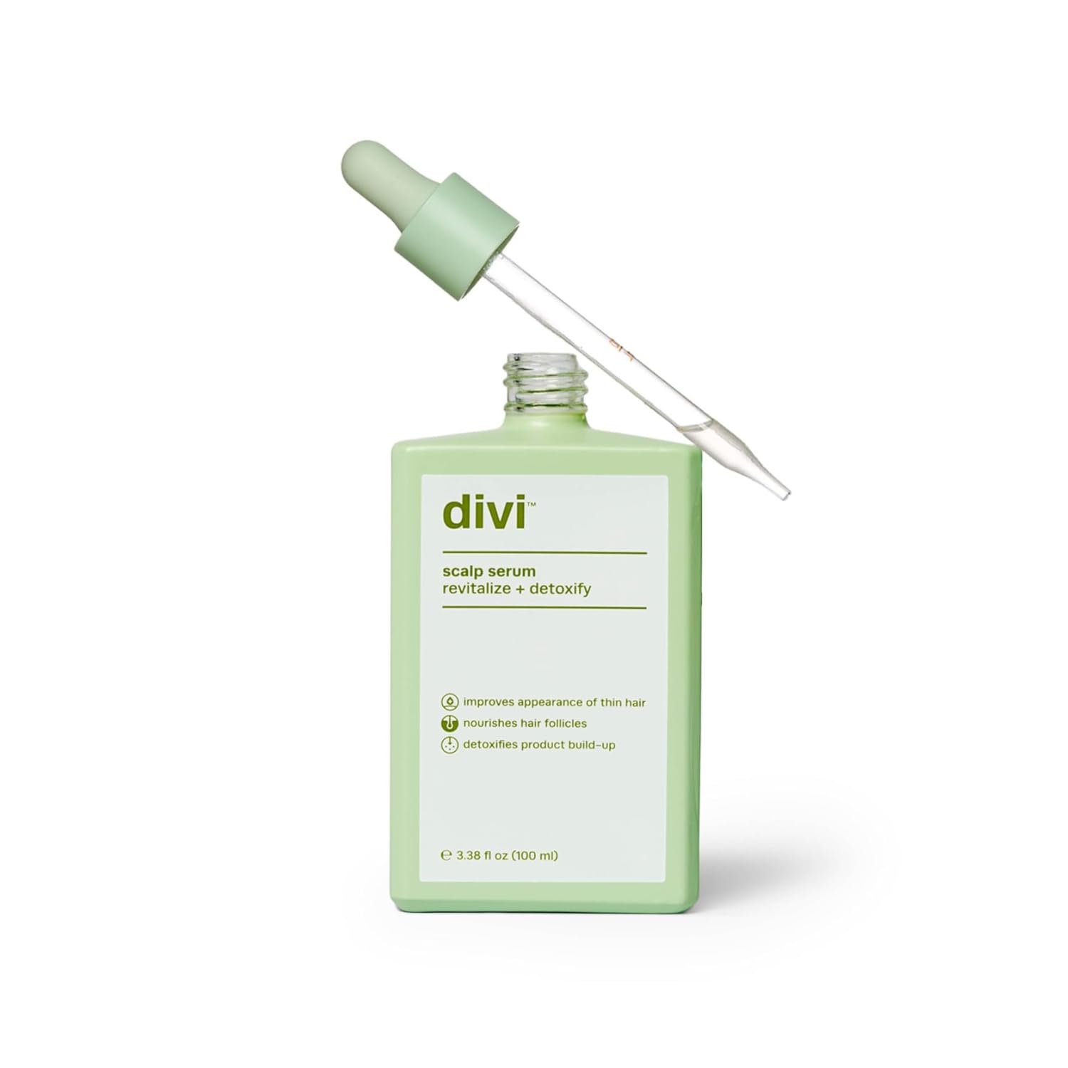 Divi hair serum bottle close-up showing a lightweight, residue-free formula for daily use