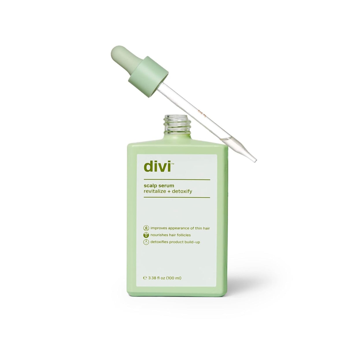 Divi hair serum bottle close-up showing a lightweight, residue-free formula for daily use