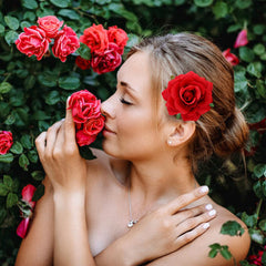 Dizila red rose hair clip for prom or dance performances with refined flair