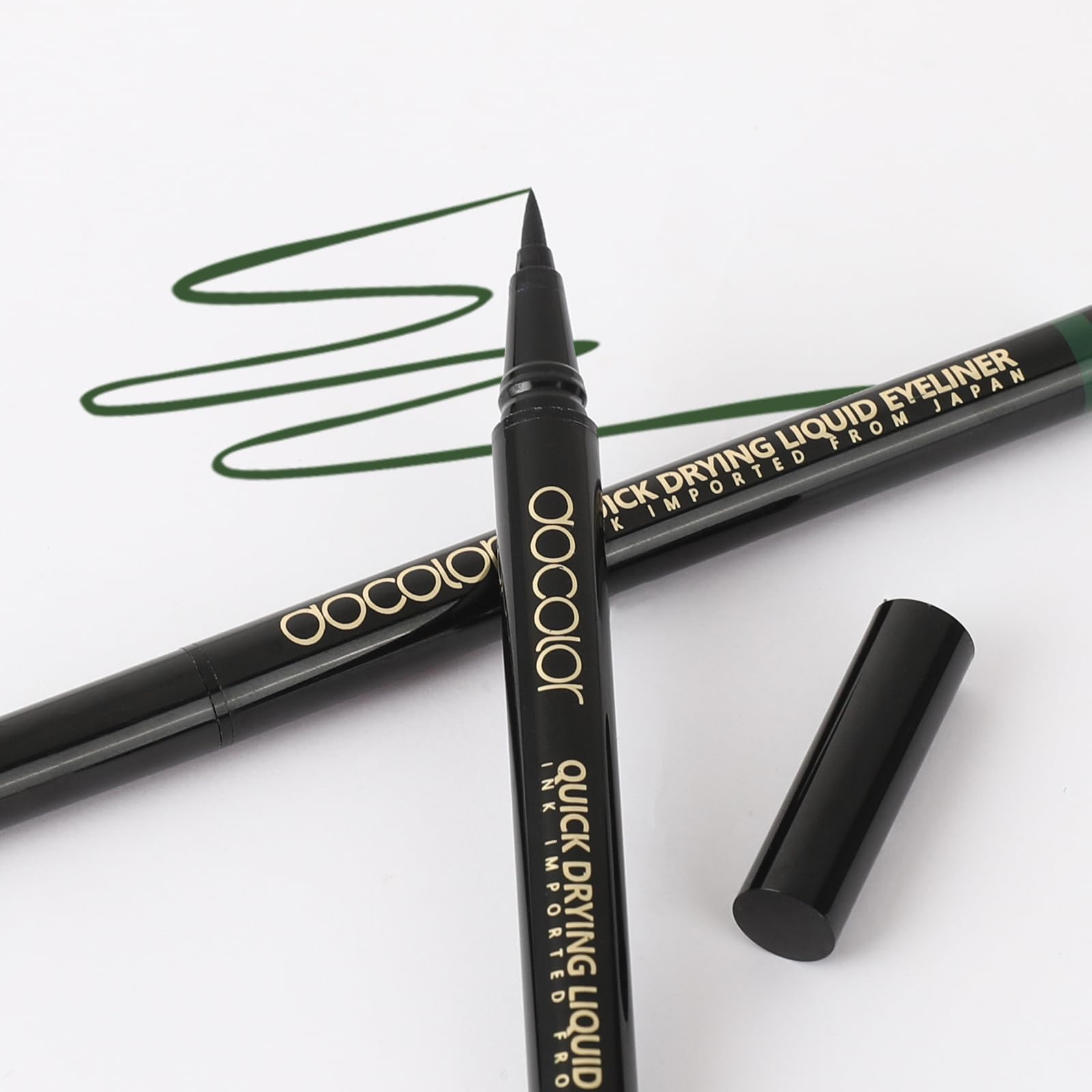 docolor green eyeliner swatch on hand shows vibrant color