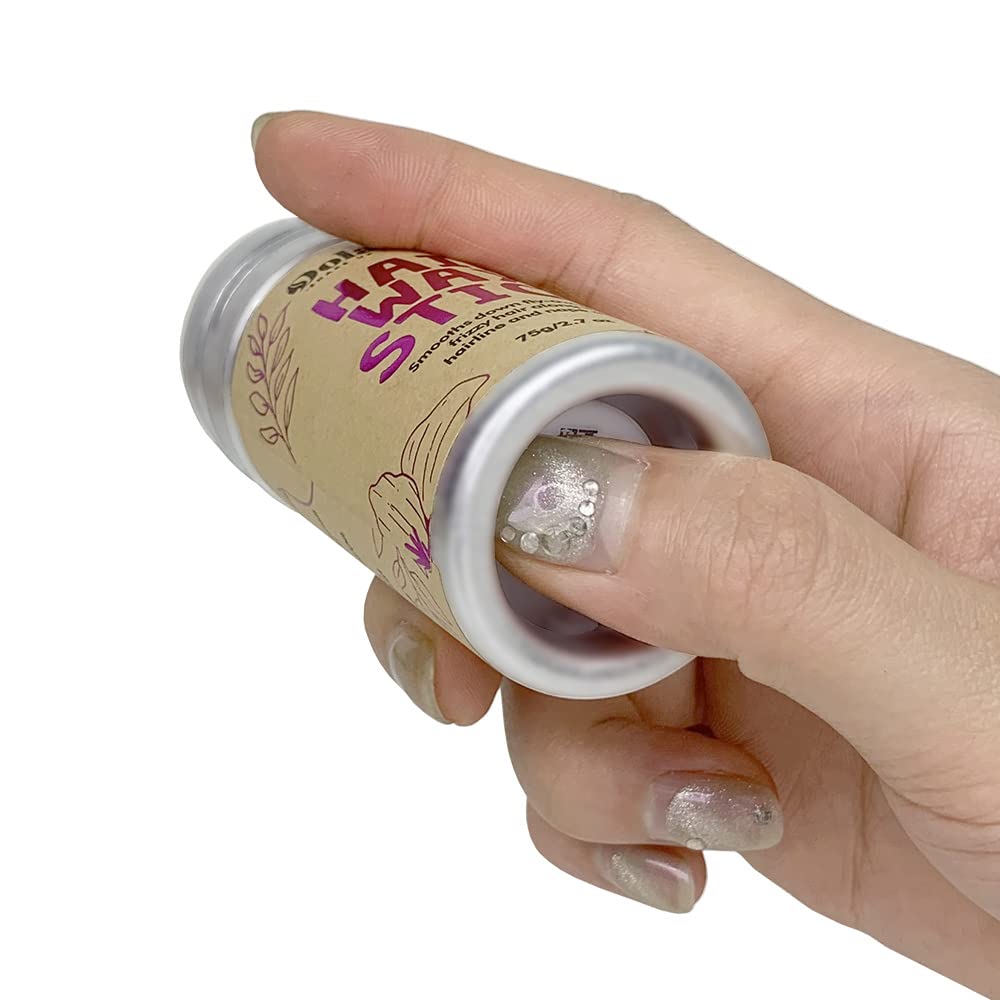 Dolahair hair wax stick close-up gliding through straight and curly hair.