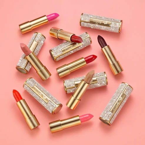 Dolly Beauty Heaven's Kiss lipstick closeup in Rosebud shade offers versatile, day-to-night color