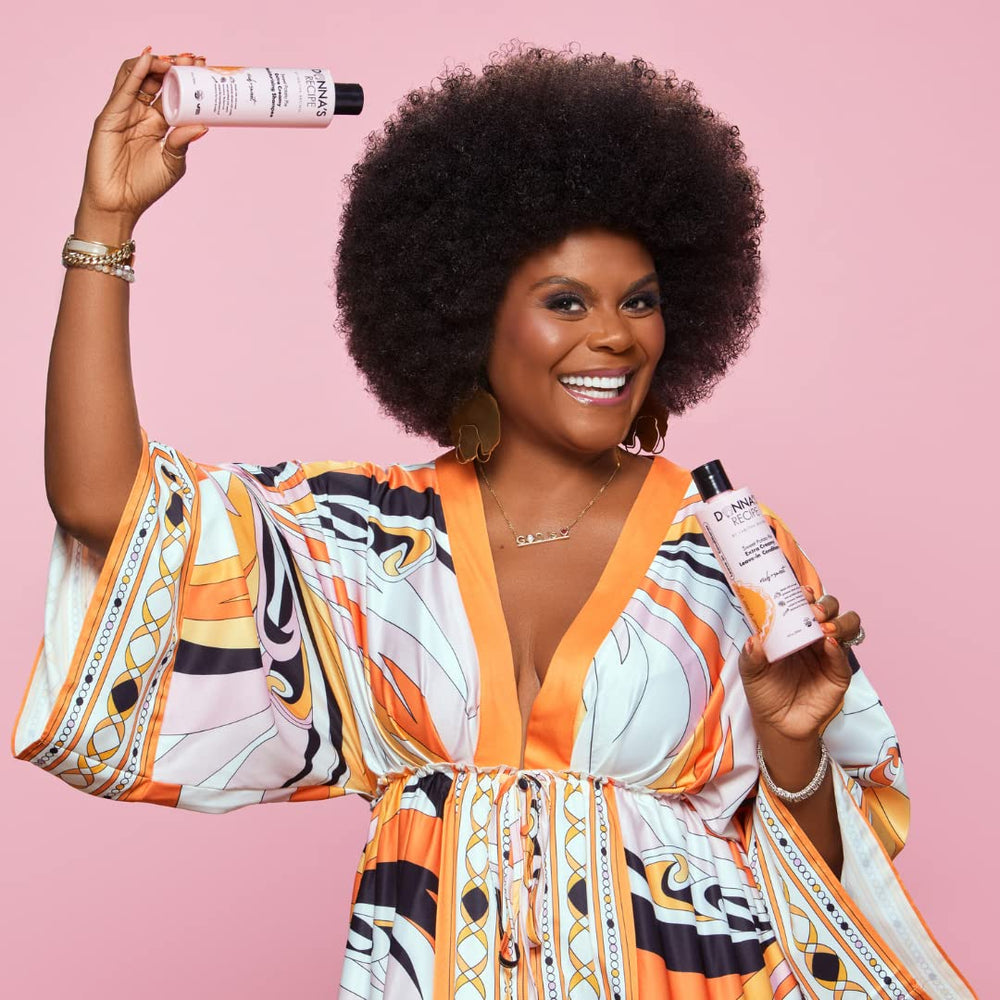 Donna's Recipe leave-in application gesture shows easy, mess-free styling.