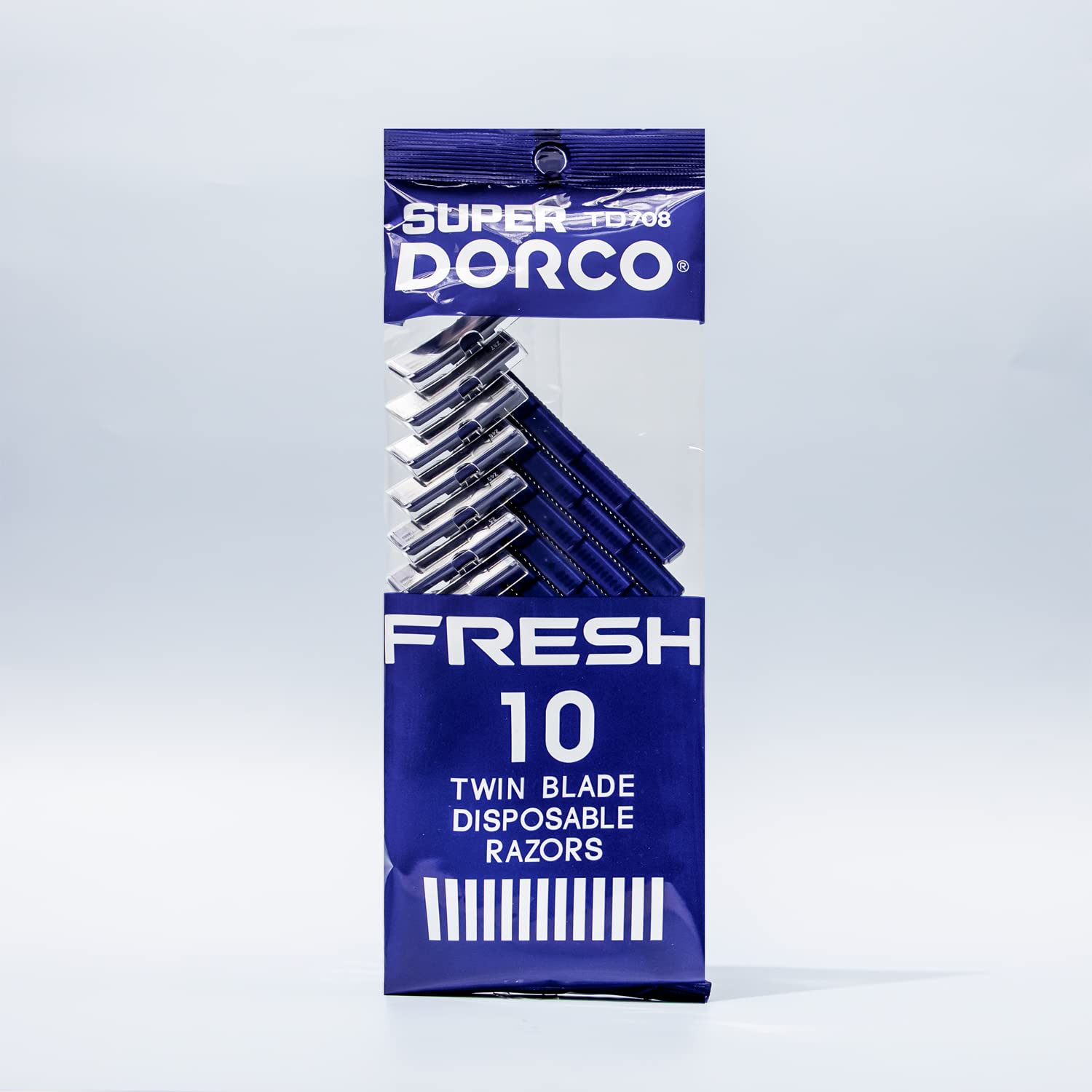 Dorco Fresh twin-blade disposable razor handle close-up showing non-slip grip for precise control.