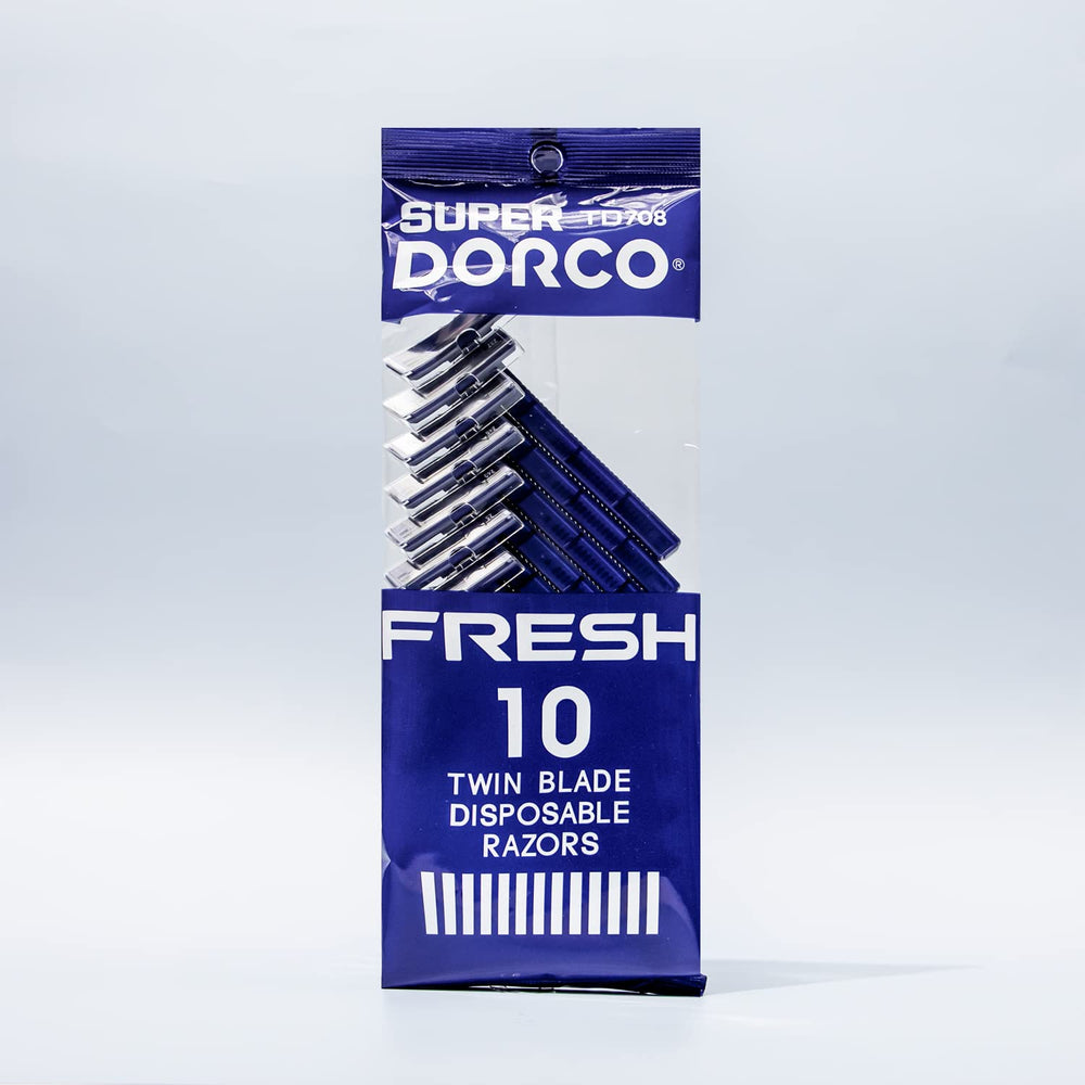 Dorco Fresh twin-blade disposable razor handle close-up showing non-slip grip for precise control.