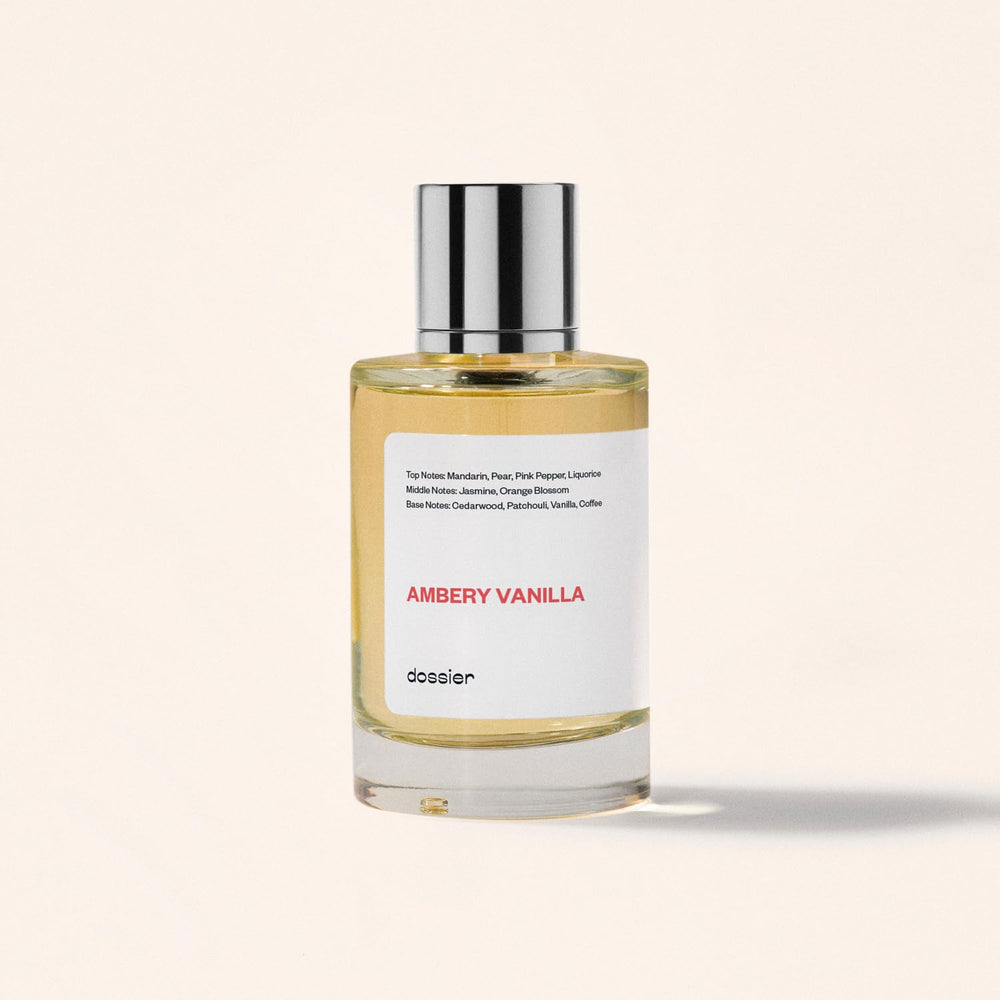 Dossier Ambery Vanilla base notes close-up features Cedarwood, Vanilla, and Coffee for lasting warmth.