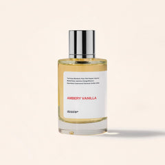 Dossier Ambery Vanilla base notes close-up features Cedarwood, Vanilla, and Coffee for lasting warmth.