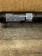 doTERRA Peppermint Touch temple-application captured for quick relief.
