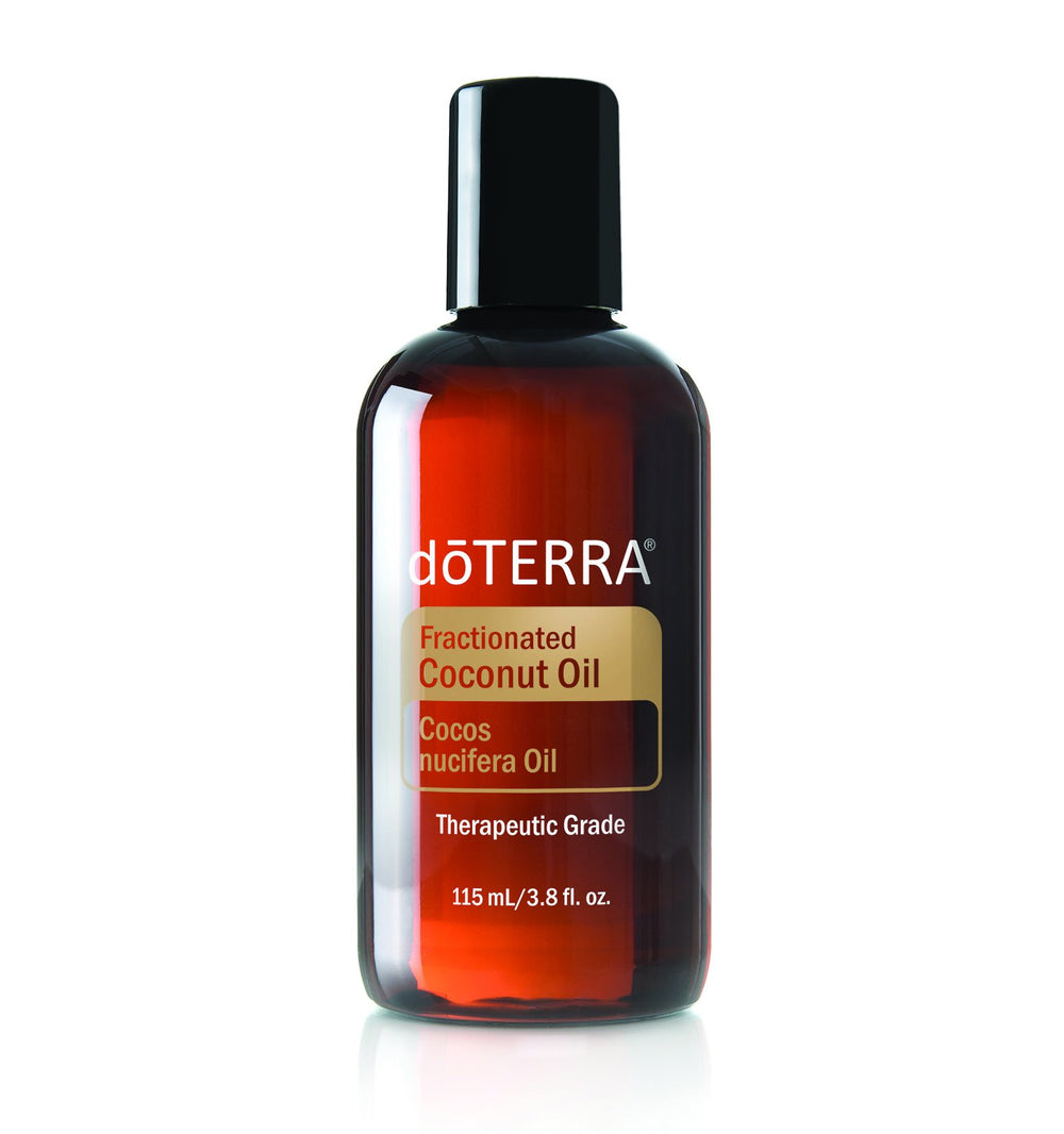 doTERRA fractionated coconut oil bottle pour highlighting light texture for skin hydration and easy essential oil blending
