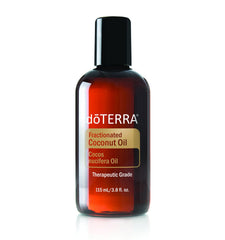 doTERRA fractionated coconut oil bottle pour highlighting light texture for skin hydration and easy essential oil blending