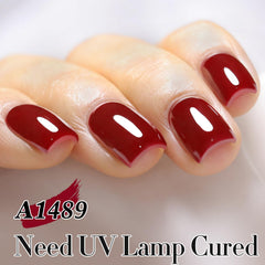 Double Rhythm Cherry Red A1489 bottle close-up with glossy color payoff.