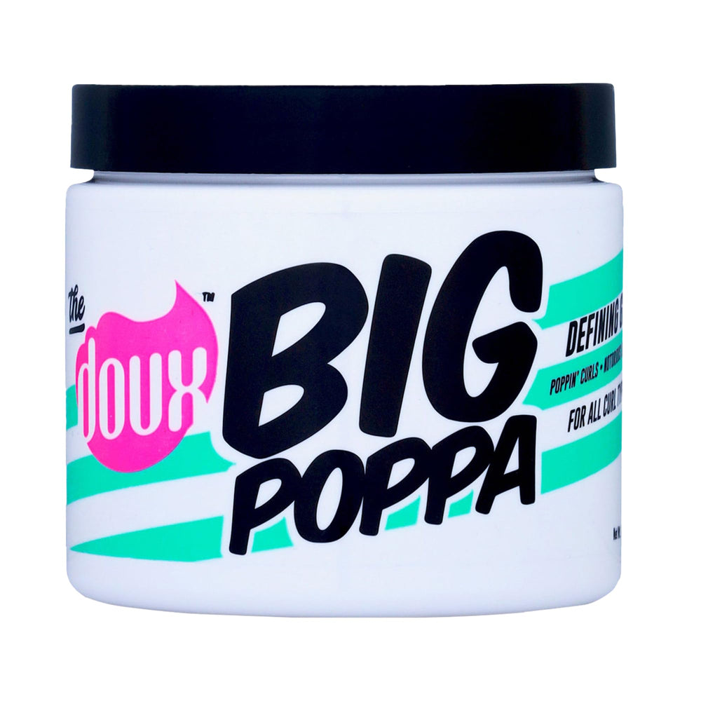 The Doux BIG POPPA bottle closeup showing sleek packaging for frizz control