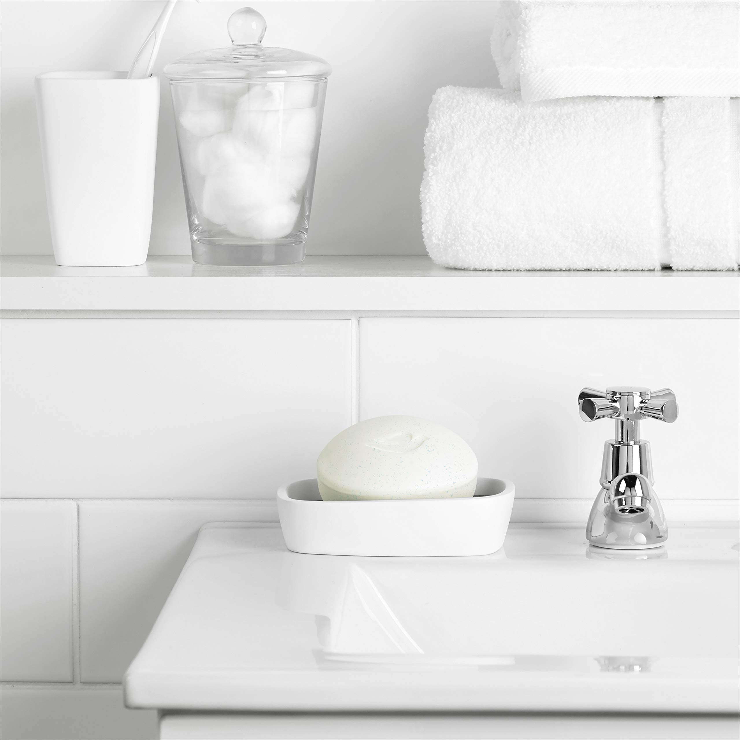 Dove beauty-bar-body-cleanse shows full-body use for soft skin.