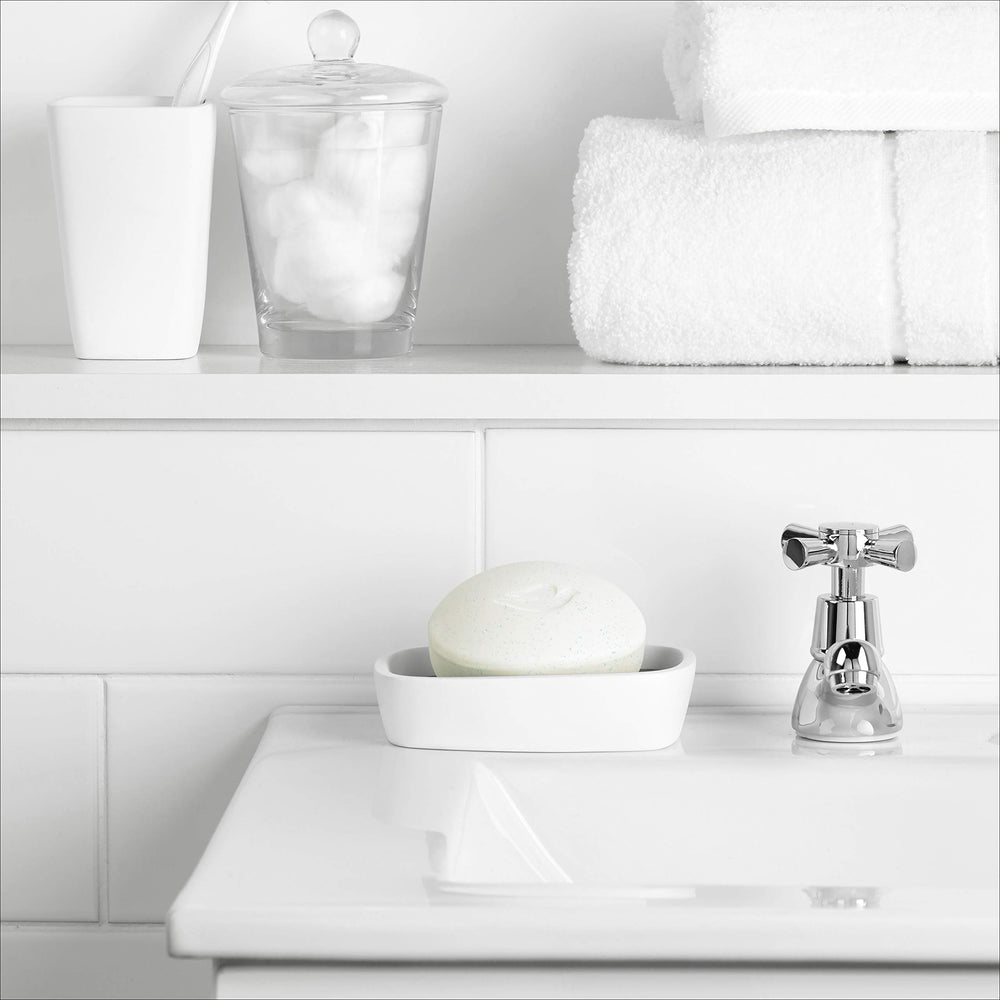 Dove beauty-bar-body-cleanse shows full-body use for soft skin.