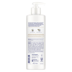 Dove Hair Therapy conditioner being applied for smoother detangling and reduced breakage.