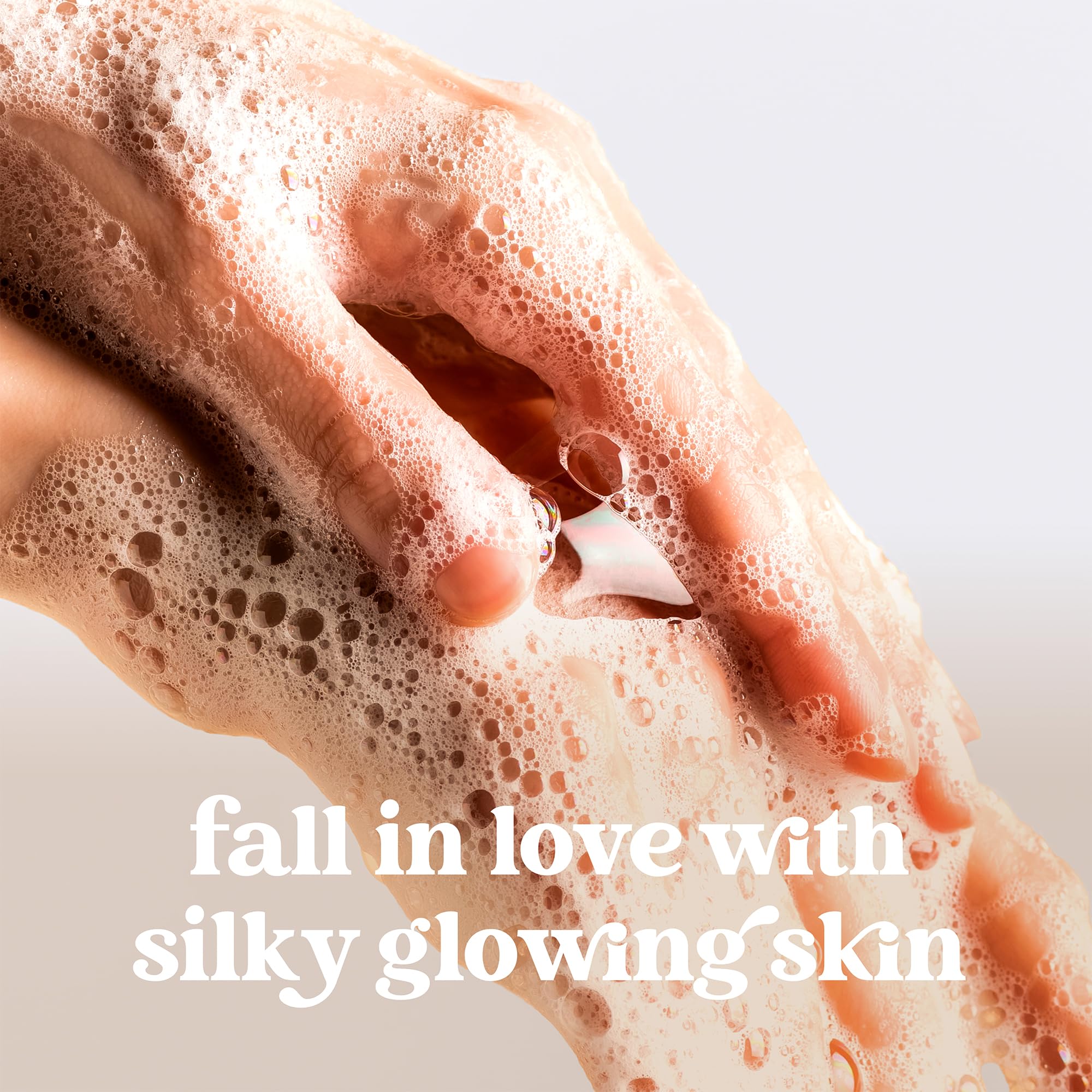 Dove Hand Soap Peppermint Bark bottle adds refreshing scent while cleansing hands.