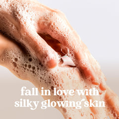 Dove Hand Soap Peppermint Bark bottle adds refreshing scent while cleansing hands.