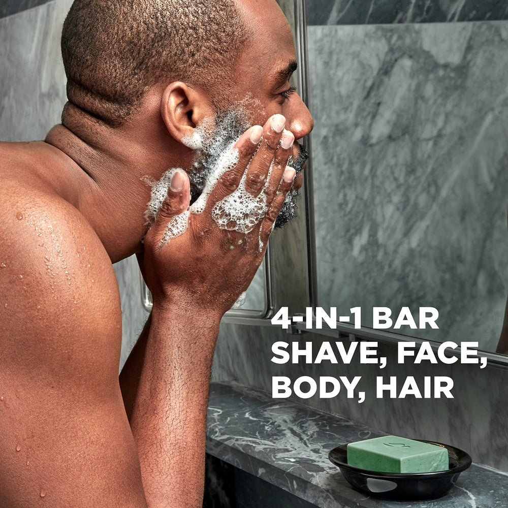 Dove Men+Care essential oils closeup shows olive and jojoba enriching hydration
