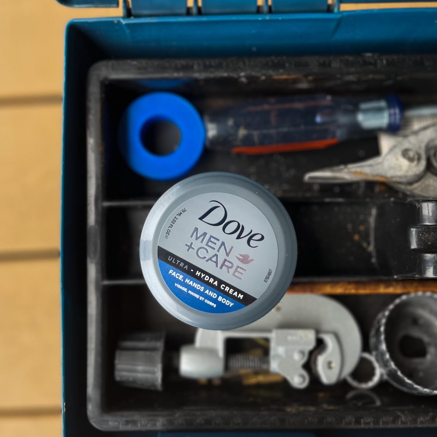 Dove Men+Care Ultra Hydra Cream Lotion face-application demonstrates convenient 3-in-1 use.