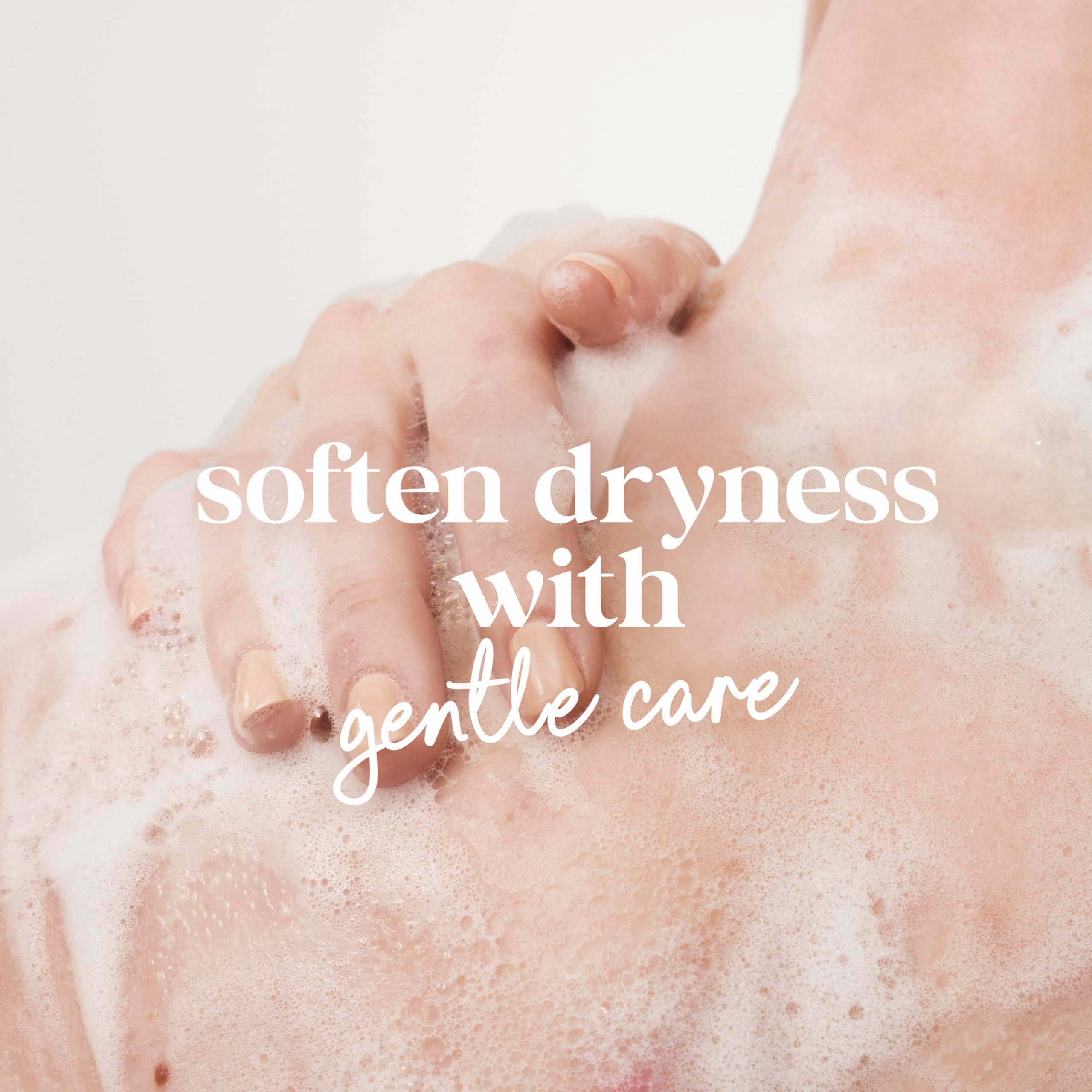 Dove Sensitive Skin Body Wash bottle pour captures rich lather for soft, hydrated skin.