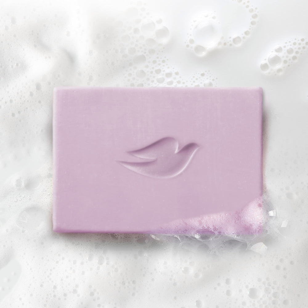 Dove Serenity Seeker body application shot demonstrates gentle body wash-like use.