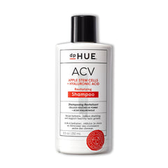 dpHUE ACV Revitalizing Shampoo bottle pouring for balanced scalp and fuller-looking hair.
