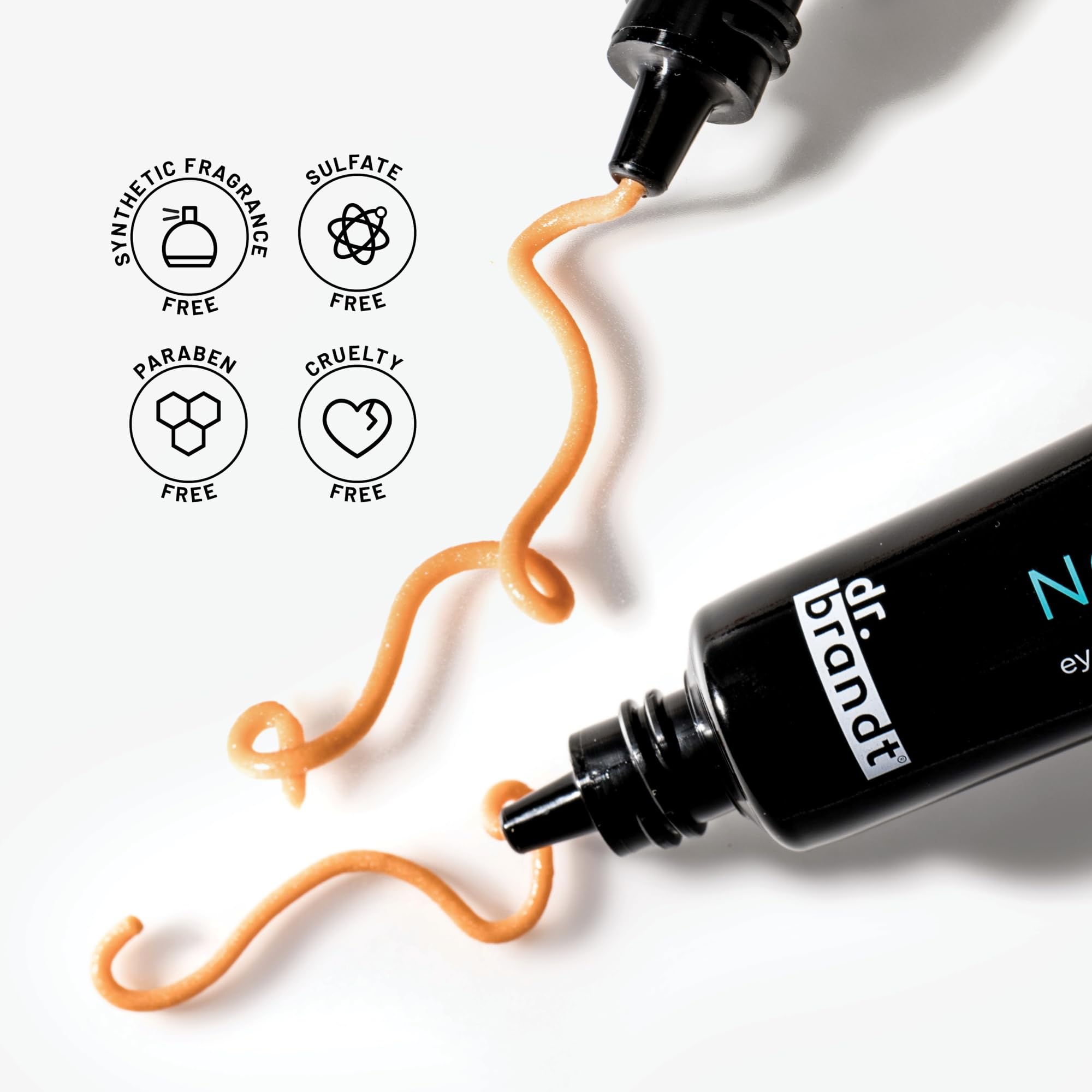 Dr. Brandt Needles No More applying to dry under-eye area with gentle patting.