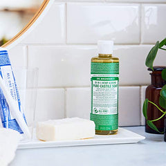 Dr. Bronner's Almond Castile hands and face image shows gentle, versatile wash.
