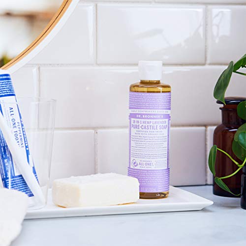 Dr. Bronner's bottle pour-spout demonstrates concentrated formula for economical dilution.