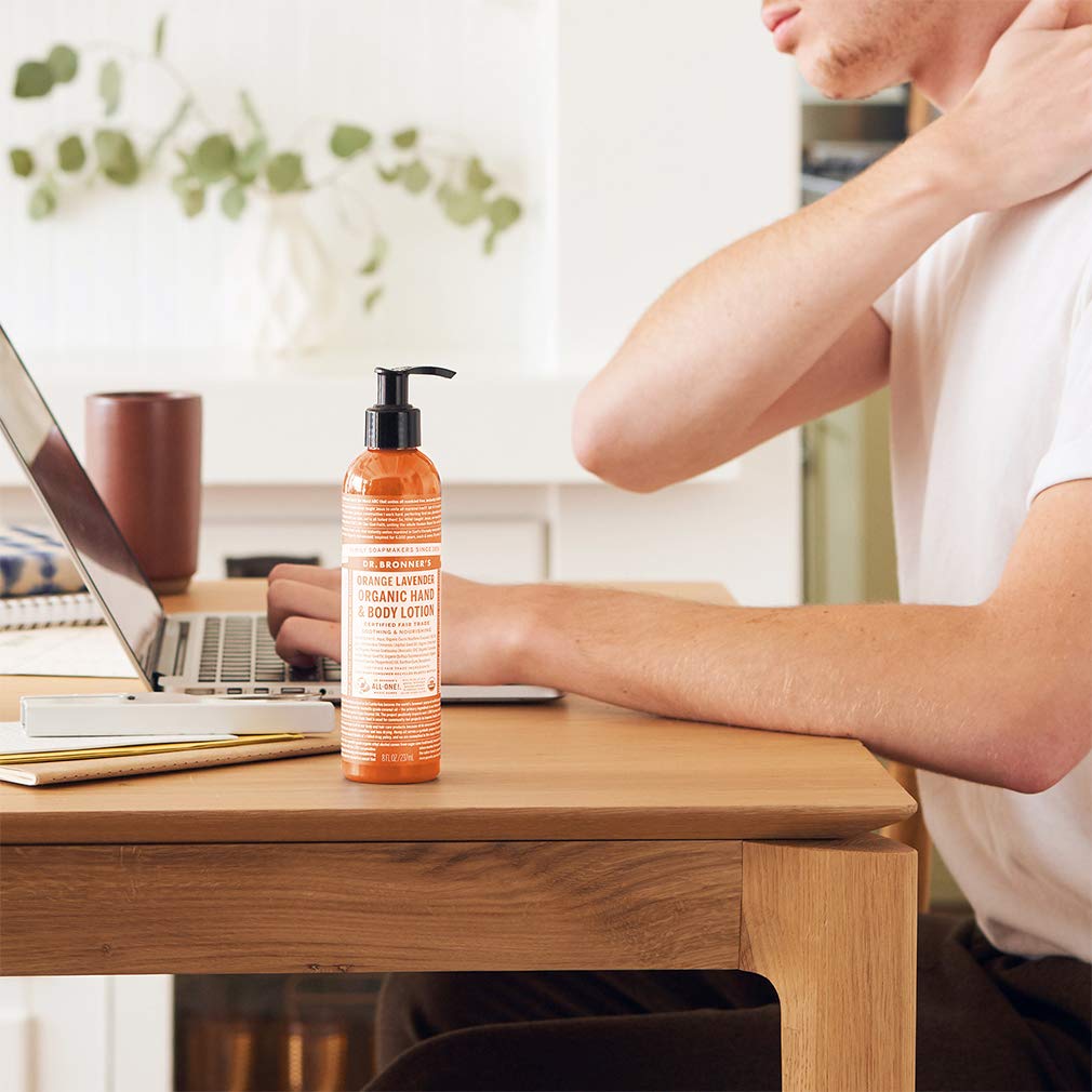 Dr. Bronner's Orange Lavender lotion being used on hands and face
