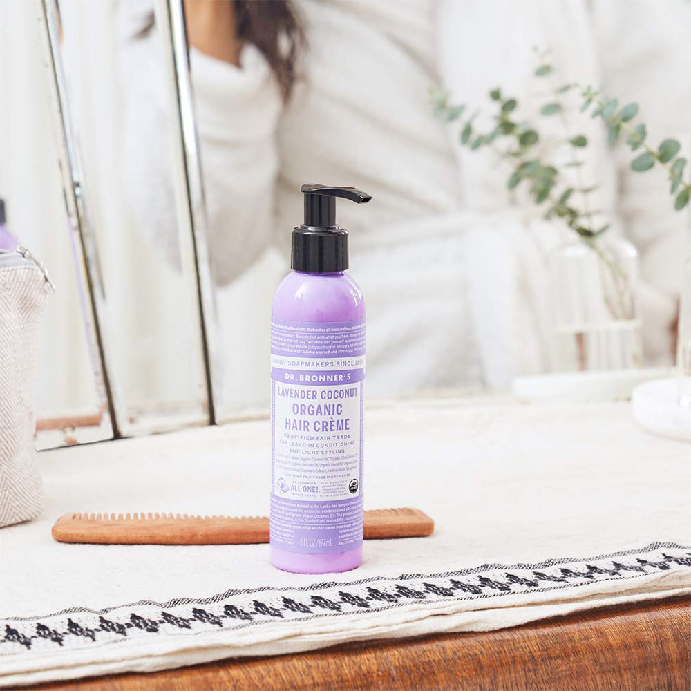 Dr. Bronner's Organic Hair Creme applied to ends for smooth moisture.