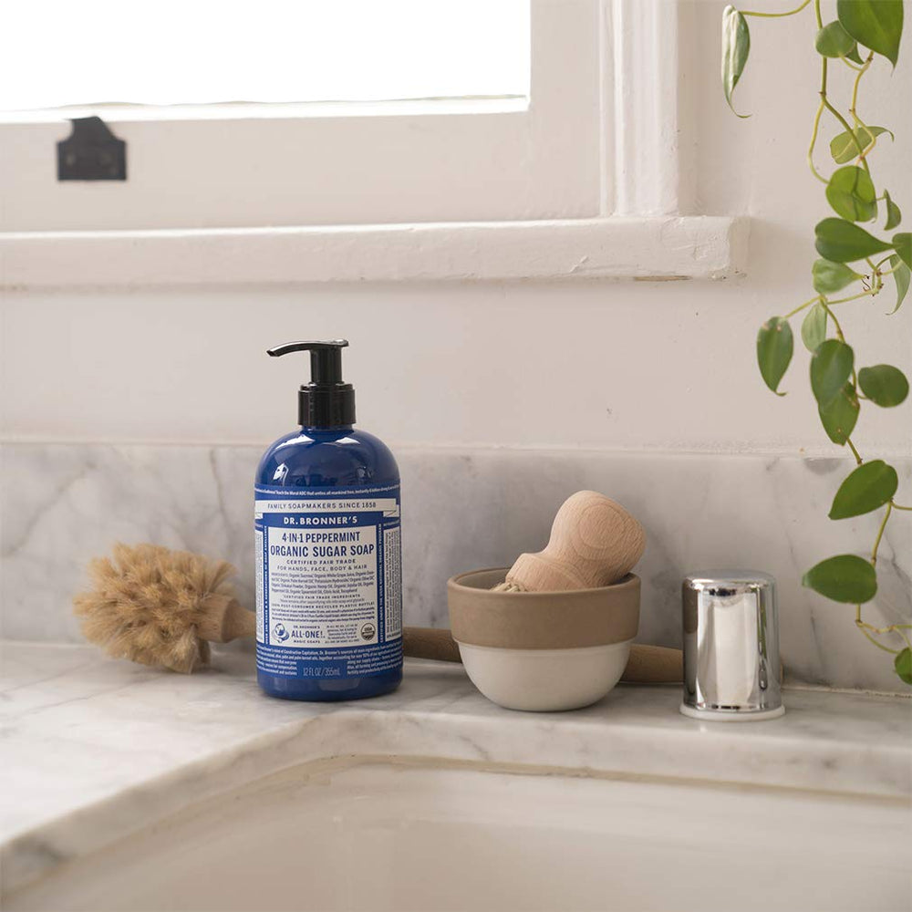 Dr. Bronner's Peppermint lather closeup highlighting creamy castile foam.